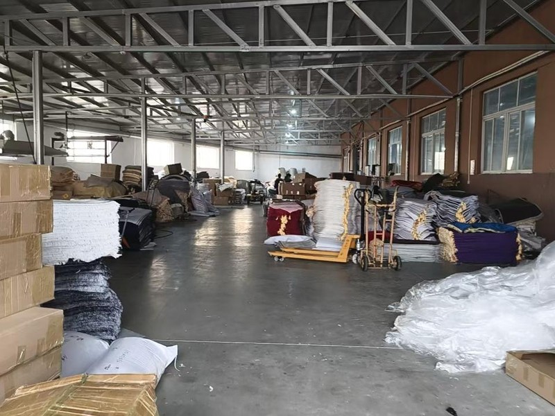 Muslim prayer rug production line at Zainyunoor factory in China